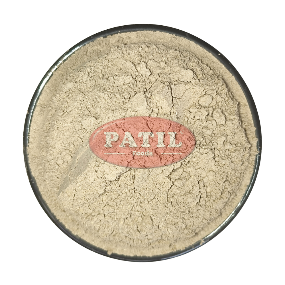 Closeup of Punarnava powder showing fine texture and natural earthy color