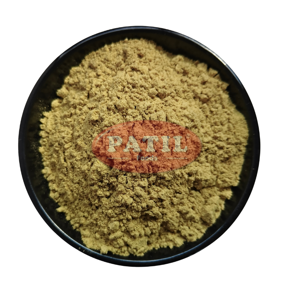 Closeup of Gokhru powder showing fine texture and natural earthy color
