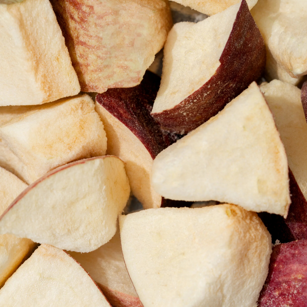 Close-up of freeze-dried apple slices showing crispy texture, vibrant color, and purity—Patil Foods natural superfruit