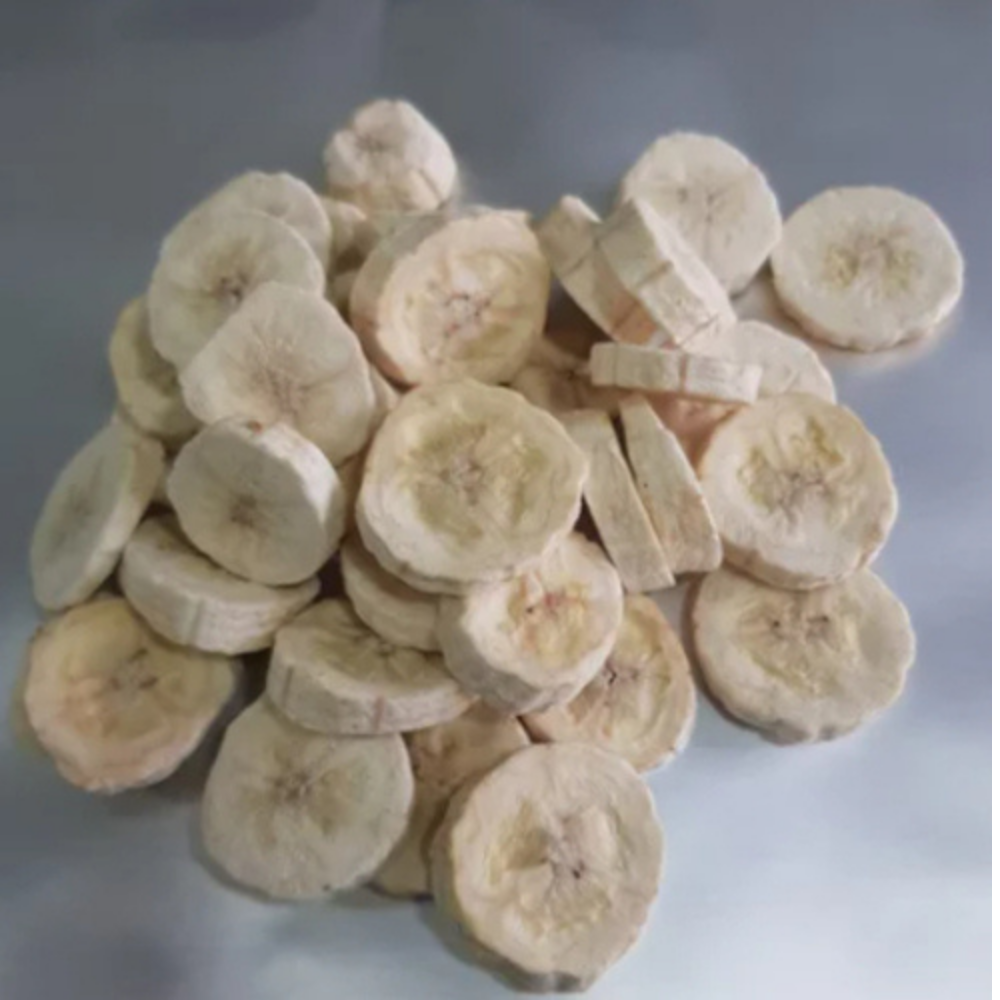 Close-up texture of pure freeze-dried banana slices showing natural color and crispy quality, Patil Foods premium superfruit