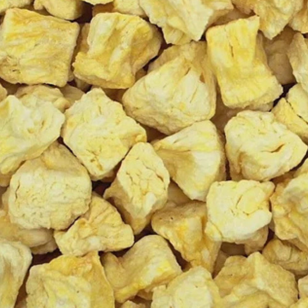 Close-up texture of freeze-dried pineapple slices—pure, crispy, golden color, no additives, Patil Foods quality